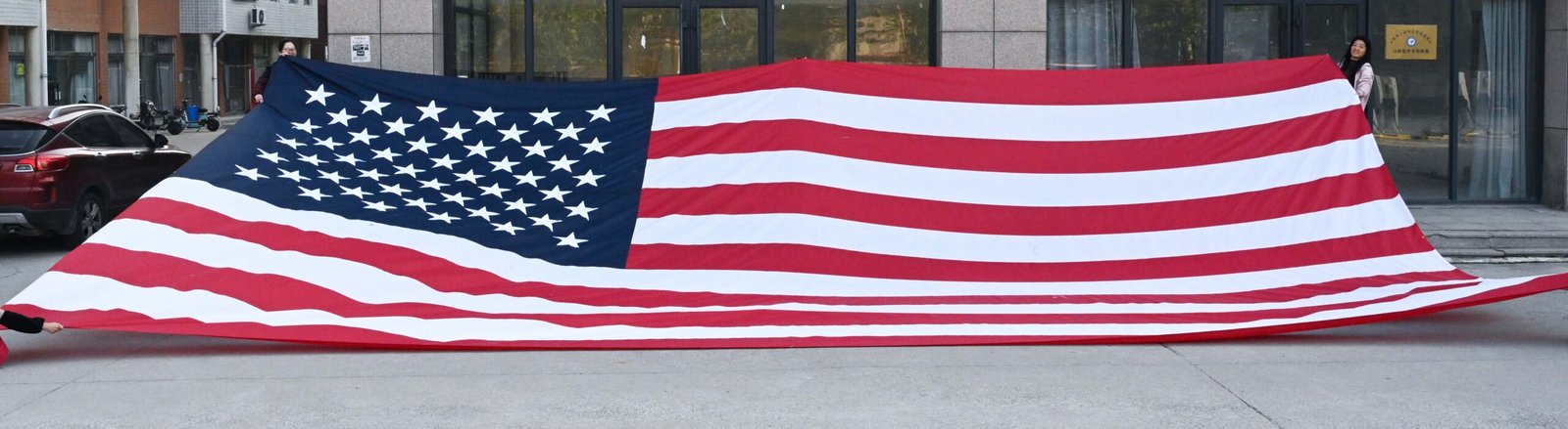 A collage showing a historical flag from ancient China alongside a modern 210D polyester flag waving outdoors under bright sunlight, with flags-factory.com watermark corner